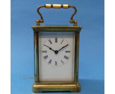 A French gilt-brass Carriage Clock, of plain five-glass form, 14cm high handle up, with carry case. 