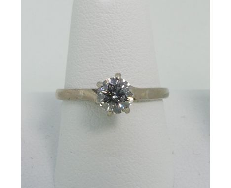 A single stone Diamond Ring,&nbsp;the brilliant cut stone c.0.6ct, in six claw set in 18ct white gold, Size N, approx total w