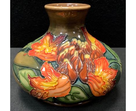 A Moorcroft Flames of the Forest pattern squat vase, designed by Philip Gibson, 1997, impressed and painted marks, 10.5cm hig