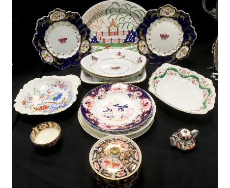 A Derby navette shaped dish, decorated with wavy leafy border nad pink flowerheads, crown ,crossed batons and D mark in red, 