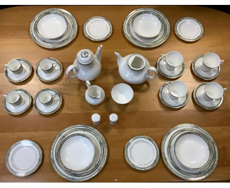 A Royal Doulton Isabella tea, coffee and dinner service, comprising teapot cups, saucers, plates, similar coffee, diner plate