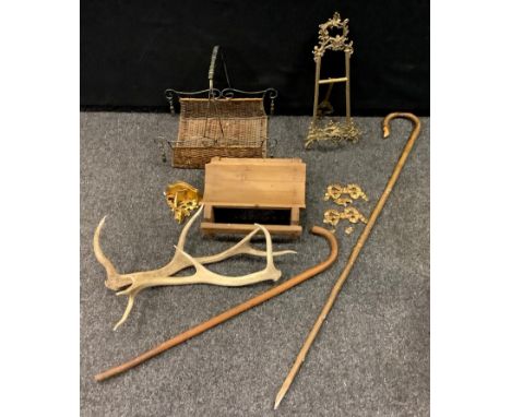 A contemporary basket;  a pine stilton trough;  two shepherds sticks;  a brass easel;  etc 