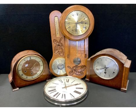 An Enfield oak mantel clock; another, Smiths; a Christopher Milner oak wall barometer; an oak wall clock; a Parrisienne Boule