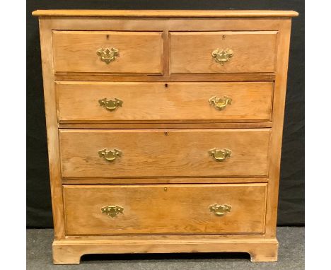 A 20th century pine chest of drawers, rectangular top above two short and three long graduated drawers, bracket feet, batwing