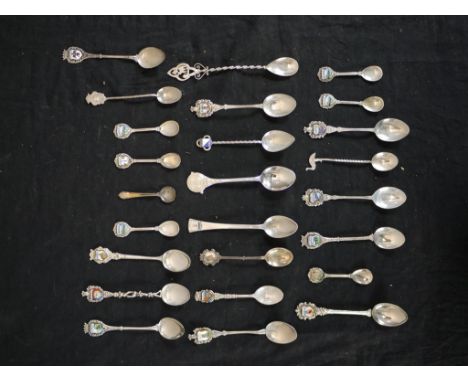 Assorted 20th century silver and white metal collectors, mostly with enamel finials together with a silver plated 1929 World 
