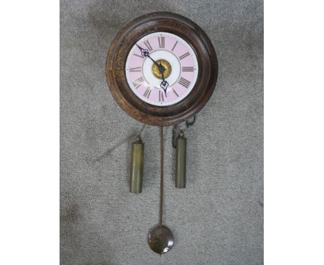 Early Victorian Postmans Alarm Clock. With pink and white ceramic dial in a fruitwood case. Two brass bound cylinder weights 