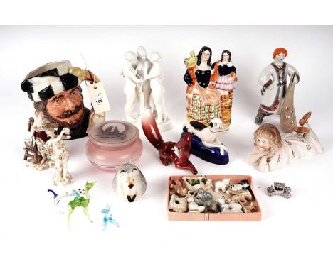 A selection of decorative ceramic figures, including: a Staffordshire figure of a greyhound dog; a Staffordshire flatback fig