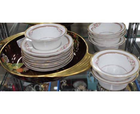 L. BERNARDAUD & CO TWELVE PIECE LIMOGES TEA SERVICE
decorated with stylised rose motifs, with gilt highlights on an ivory gro