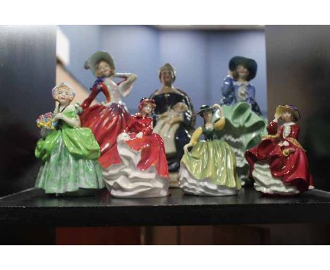 SIX ROYAL DOULTON FIGURES
together with another ceramic figure