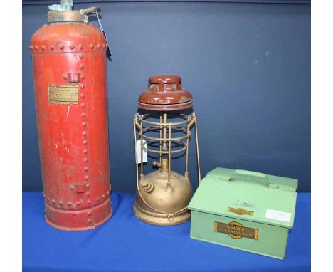 THREE VINTAGE ITEMS
comprising a green enamel toolbox, a rivetted metal fire extinguisher and a parafin lamp