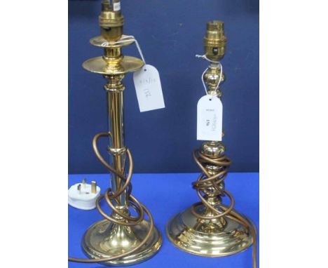 TWO MODERN BRASS TABLE LAMP BASES
together with two other brass table lamp bases, with six attractive table lamp shades, some