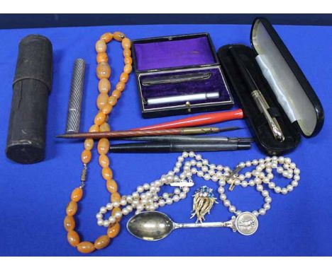 MIXED LOT OF COLLECTABLES
including pens, one notable pen by Cabouchon, small telescope, pen knife, beads, synthetic pearls e