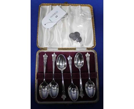 SET OF SIX SILVER TEASPOONS IN A FITTED CASE
along with a pair of cufflinks, formed from four silver 1888 four pence coins