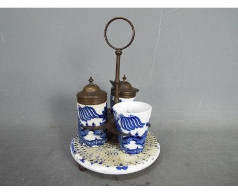 Staffordshire Pottery - a Blue and White ceramic cruet set, approx 18 cm 