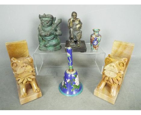 Lot to include a cloisonne bell, small cloisonne vase with floral decoration (7.5 cm height), a pair of carved stone bookends