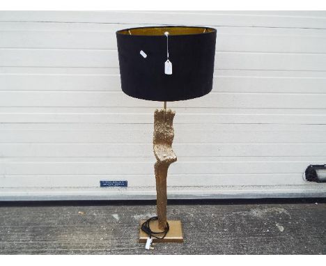 A good quality floor standing lamp with gold tone, bark effect finish and black shade, approximately 102 cm (h)