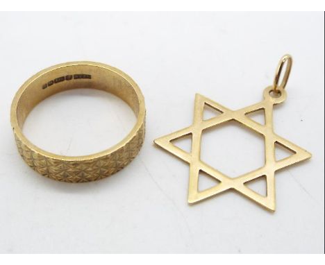 A 9ct gold wedding band, size K and a 9ct gold Star of David pendant, approximately 3.2 grams all in.