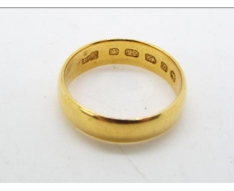 A 22ct gold wedding band, size I½, approximately 3.8 grams all in.Condition Report: Appears in good condition, band is approx