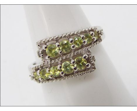 An Ambilobe Sphene &amp; Diamond Sterling Silver ring size P to Q issued in a limited edition 1 of 218 with authenticity cert