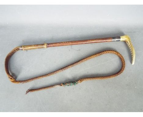 A vintage antler handled hunting whip by George Parker &amp; Sons, silver collar hallmarked for London 1931.