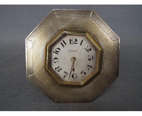 An Edward VII desk clock with octagonal, hallmarked silver surround with engine turned decoration, Birmingham assay 1903, 9.5