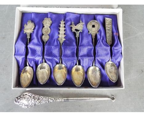 A set of six Chinese coffee spoons (presumed silver) and a silver handled button hook. [2]