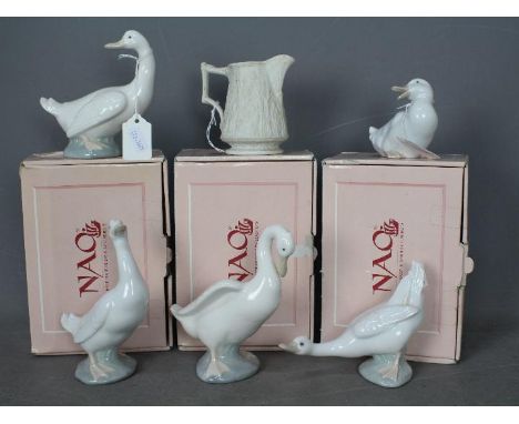 Nao - Three boxed figurines of ducks, two unboxed and a Portmeirion Parian jug. [6]