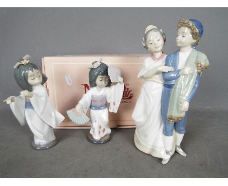 Two Lladro figurines comprising # 6230 Oriental Dance and # 6150 Playing The Flute (flute not present), both unboxed and a bo