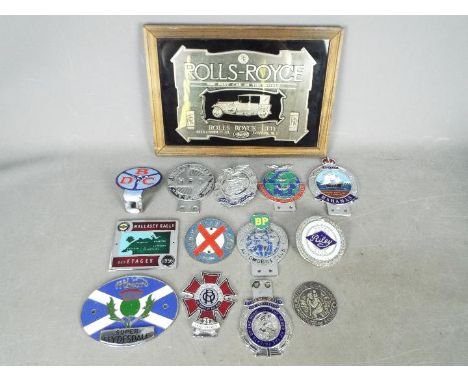 Automobilia - A collection of various car badges and a Rolls Royce advertising mirror.