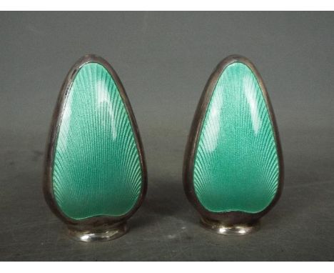 A pair of Frigast Denmark, silver and guilloche enamel salt and pepper pots, approximately 5.5 cm (h). [2]