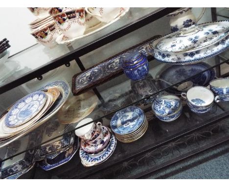 Blue and White table ware - a mixed lot of ceramics to include a meat plate, Ringtons anniversary jug and Ginger Jar, a Bursl