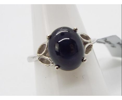 A 5.85 ct Madagascan  Blue Star Sapphire Sterling Silver ring size N to O issued in a limited edition 1 of 40 with authentici
