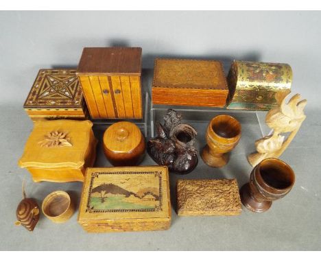 A collection of treen, trinket boxes, Japanese puzzle box and similar.