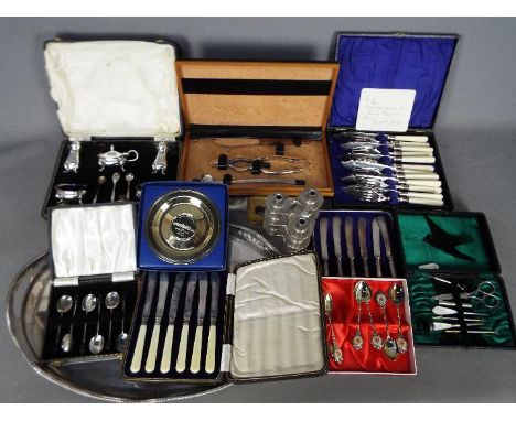 A quantity of silver plated tableware, boxed cutlery sets and similar