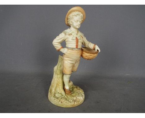 Royal Worcester - A figurine of a boy carrying a basket, shape # 1388, impressed James Hadley signature, date mark for 1892, 