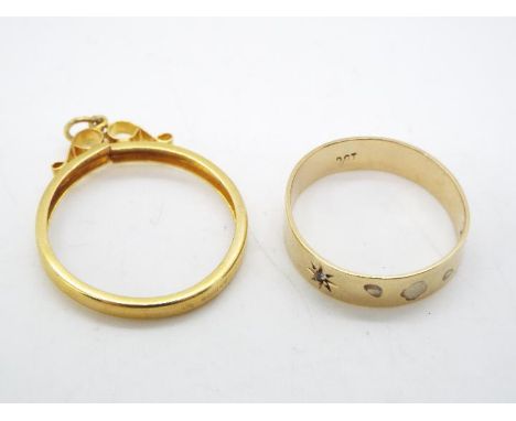A stone set wedding band stamped 9ct, size R (slightly misshapen) and a 9ct gold sovereign mount, approximately 3.3 grams all