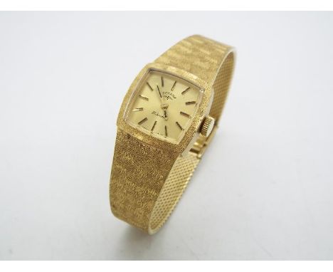 A 9ct gold cased Rotary wristwatch on 9ct gold snap clasp bracelet (16 cm length), approximately 31.4 grams all in.