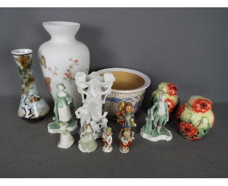 Lot to include a large glass vase, a pair of Country Artists Inspirations ginger jars with tubelined decoration, Hummel figur