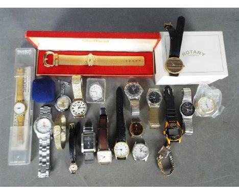 A quantity of wristwatches to include Swatch, Accurist, Rotary and similar.