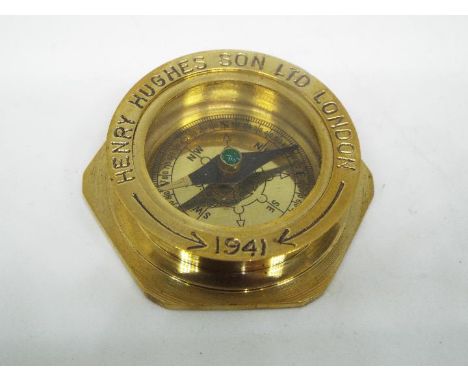 A boxed brass compass by Henry Hughes