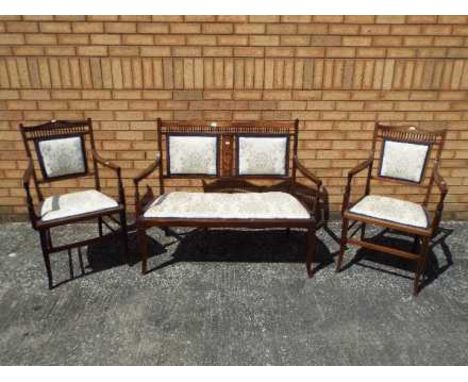 A 19th century upholstered mahogany three-piece suite, the sofa 94 cm (h) x 103 cm (w) x 52 cm (d), the armchairs 90 cm (h) x