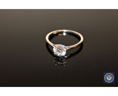 A 9ct white gold CZ solitaire ring, size R CONDITION REPORT: 2.0g