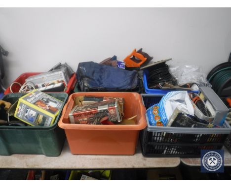 Six plastic crates of assorted hand tools, power tools, hardware, extension cable etc 