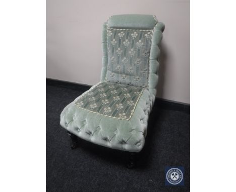 An Edwardian bedroom chair in green button fabric 