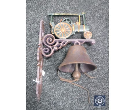 A cast iron traction engine wall bracket with bell