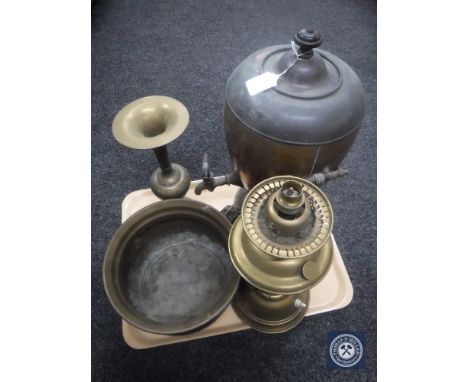 A tray of brass oil lamp, Eastern brass vase, planter and a copper samovar 