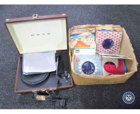 A Bush retro style record player in case together with a box of 45's