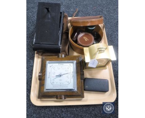 A tray of Tempus Fugit mantel clock, oak Art Deco barometer, leather box containing safety razor, compass etc