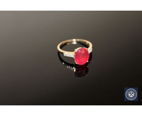 A 9ct gold ruby and CZ solitaire ring, size O/P CONDITION REPORT: 2.4g