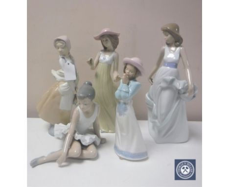 Five Nao figures; Ballerina, girl with basket, girl with flower (a/f), girl praying and girl in flowing dress